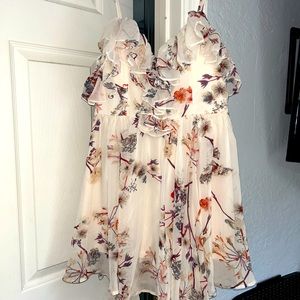 Mini dress with spaghetti straps and side arm straps beautiful for baby showers